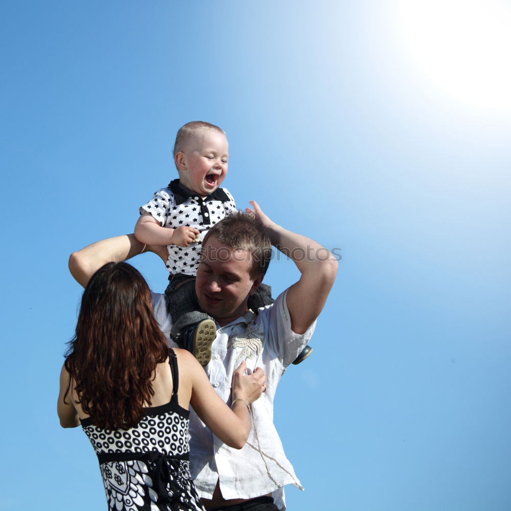 Similar – Image, Stock Photo Father holds up his little son