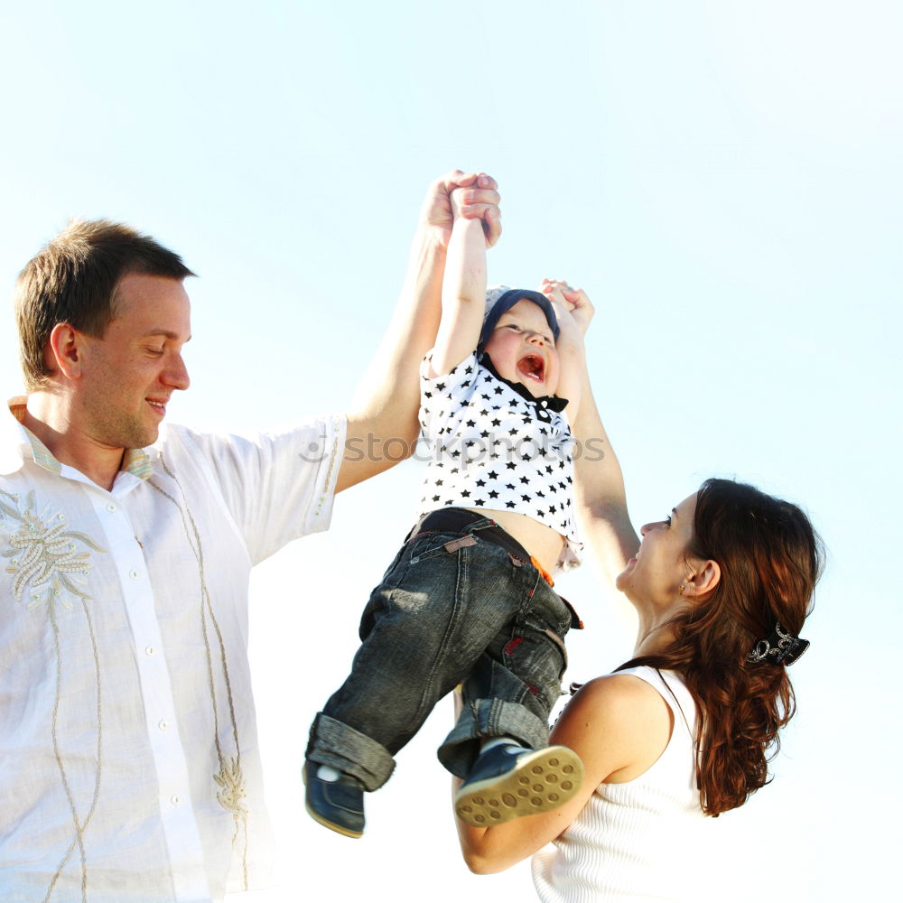 Similar – Father and son playing in the park at the day time.