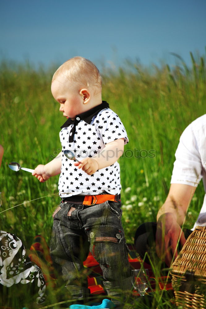 Similar – Image, Stock Photo Young boy and his little sister sitting on jetty over the lake and dipping feet in water on sunny day in the summertime