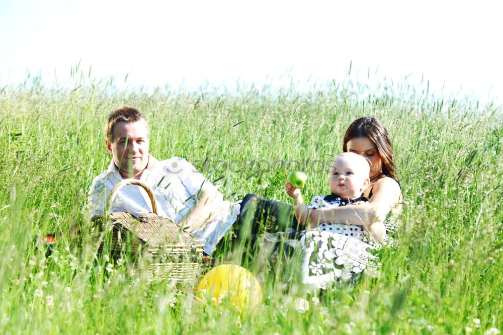 Similar – Image, Stock Photo Family spending vacation time together on a picnic