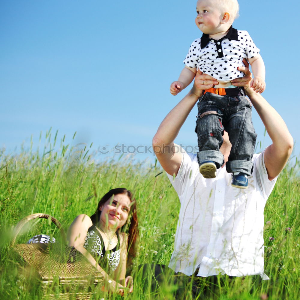 Similar – Image, Stock Photo Father and son standing on the road at the day time. Concept of tourism.