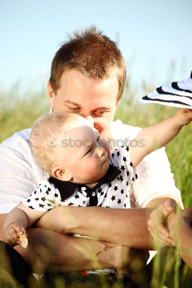 Similar – Image, Stock Photo Young boy and his little sister sitting on jetty over the lake and dipping feet in water on sunny day in the summertime