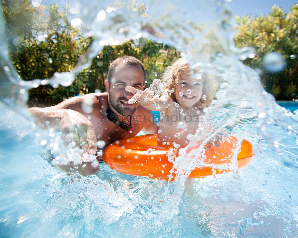 Similar – Two funny kids  in the pool on an air mattress