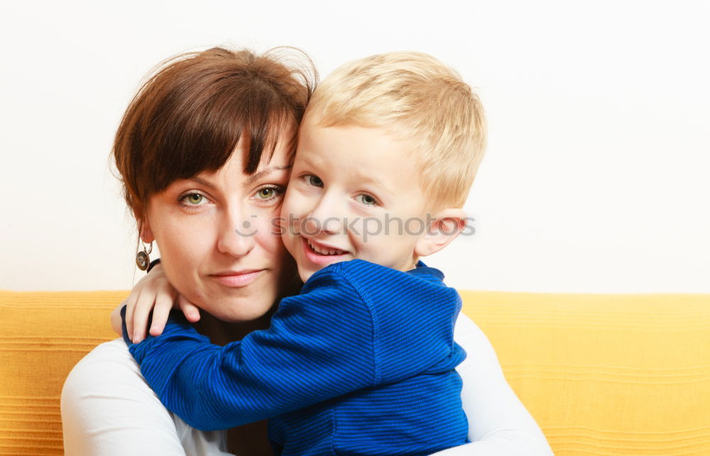 Similar – Image, Stock Photo A mother hugs her young son on the way to school, and a mother and boy say goodbye before school. Concept of education and training, return to school