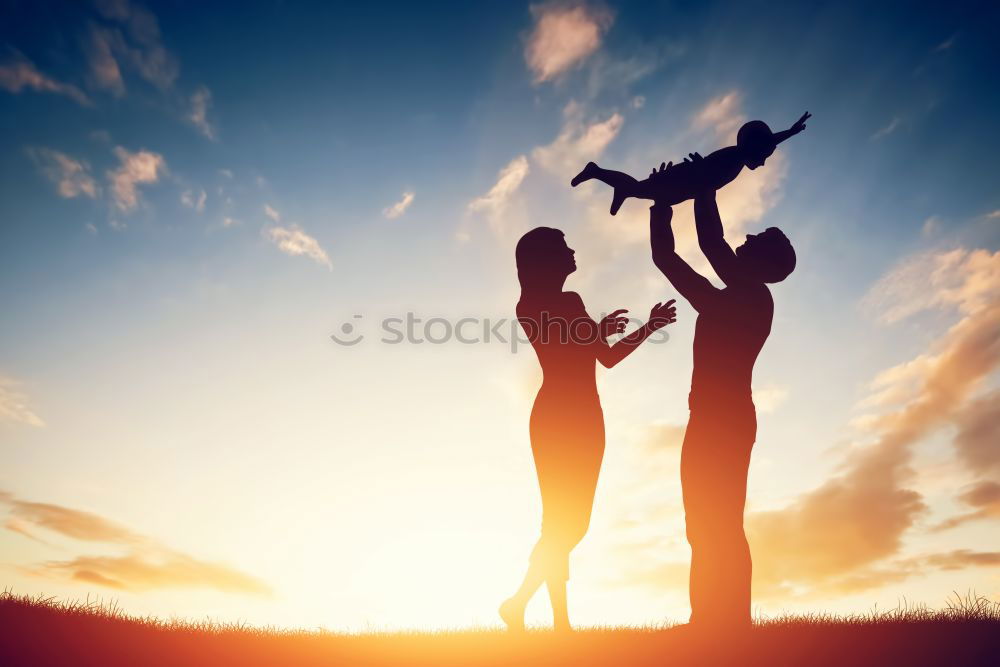 Similar – Father and son playing on the beach at the day time. Concept of friendly family.