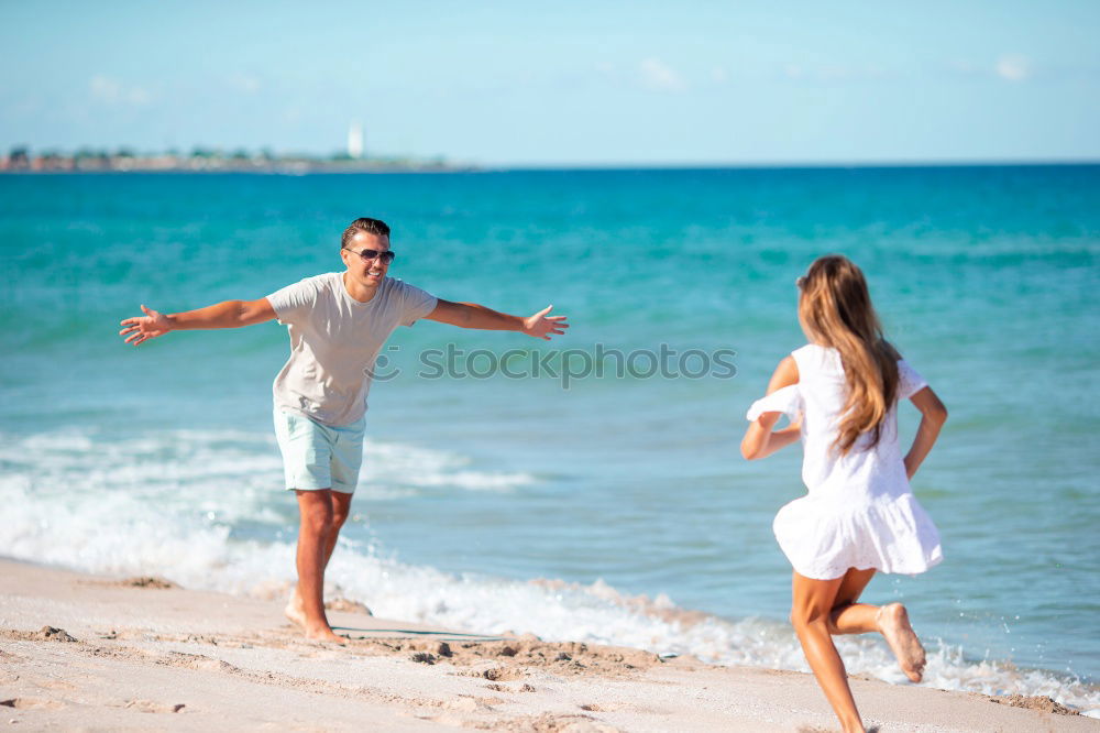 Similar – Image, Stock Photo Father and son playing on the beach at the day time.
