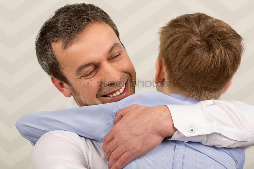 Similar – Image, Stock Photo Father helping son to adjust a bowtie. Preparation before important event