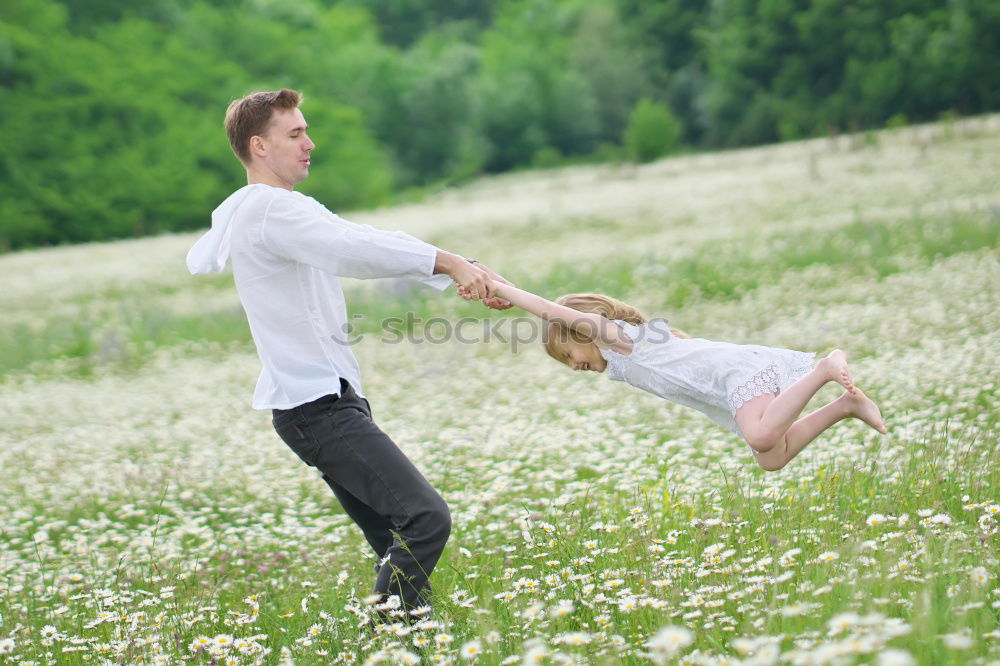Similar – Image, Stock Photo Father and son playing at the park near lake at the day time.