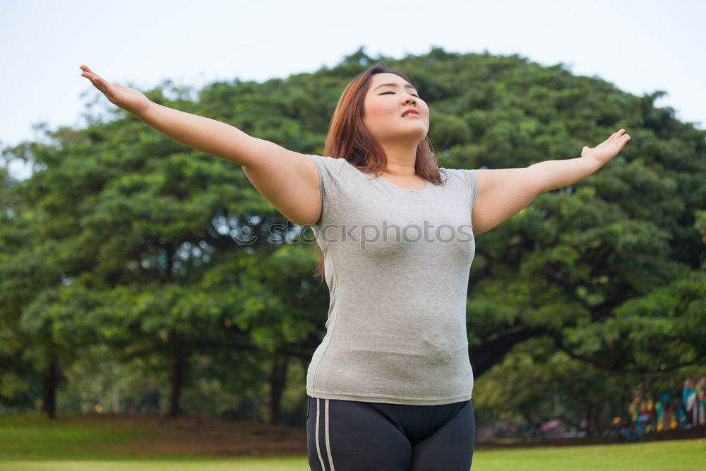 Similar – Beautiful young woman meditates in yoga asana Padmasana