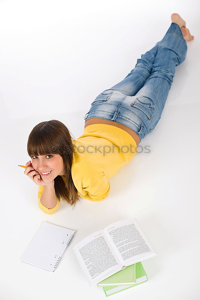 Similar – Image, Stock Photo Schoolgirl reading a book in classroom