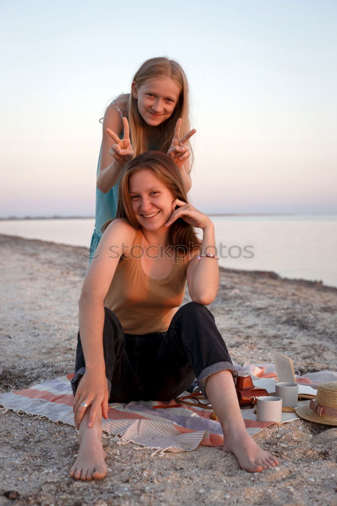 Similar – Image, Stock Photo caucasian mother having his son on her back at the beach