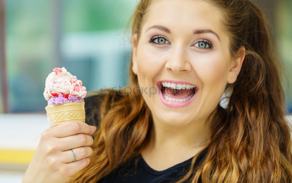 Similar – Girls eating ice cream on the promenade in summer holiday