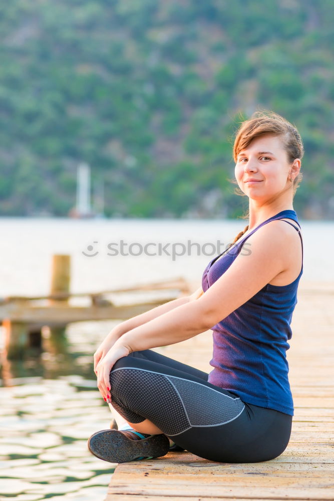 Similar – Image, Stock Photo Woman doing yoga by the lake