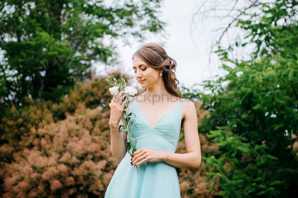 Similar – Image, Stock Photo kiss me …. young brunette woman dressed like a princess looks skeptically at a frog on her hand and considers whether to kiss it