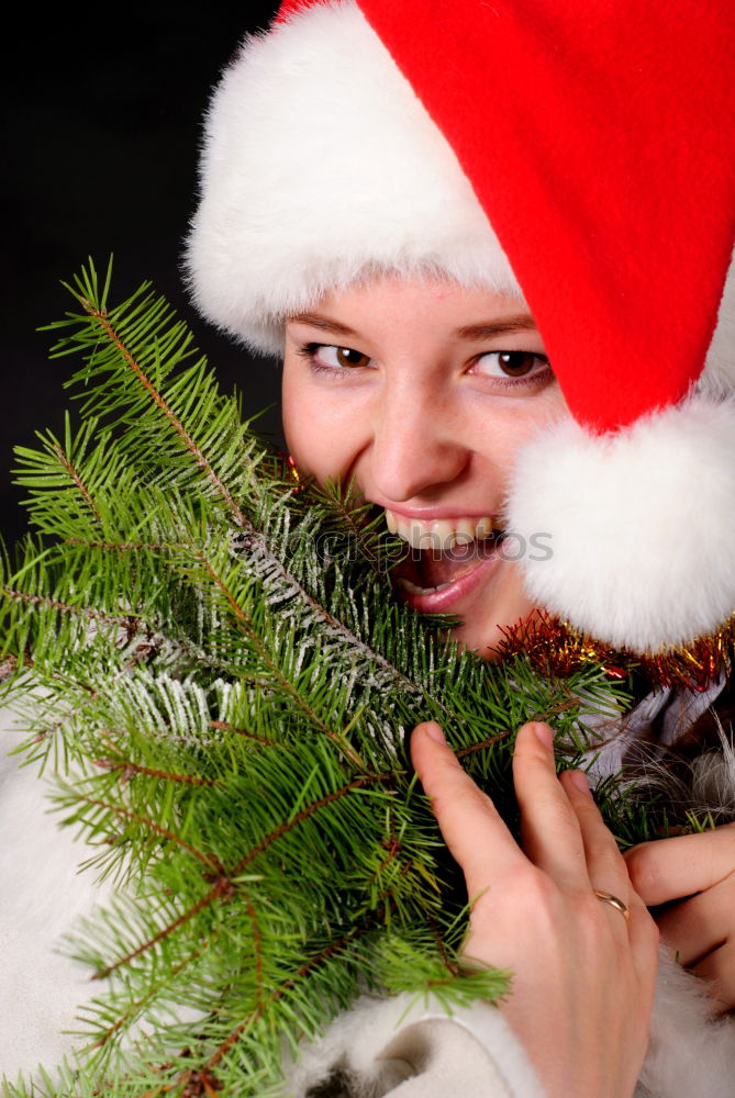 Similar – Foto Bild Junges Mädchen schmückt Weihnachtsbaum, hält große Weihnachtskugel. Junges blondes Mädchen in blauem Jeansrock, rosa Bluse und Strumpfhose. Mädchen hat eine lustige Rentiermaske auf dem Gesicht. Junges Mädchen feiert Weihnachten zu Hause