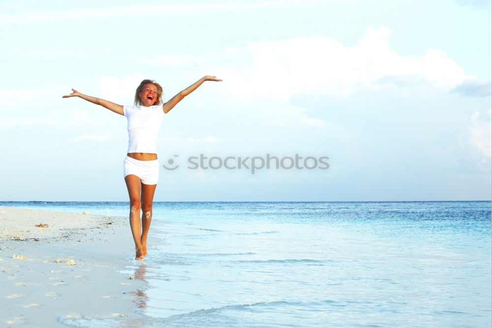 Similar – Image, Stock Photo woman with long pink dress on a tropical beach