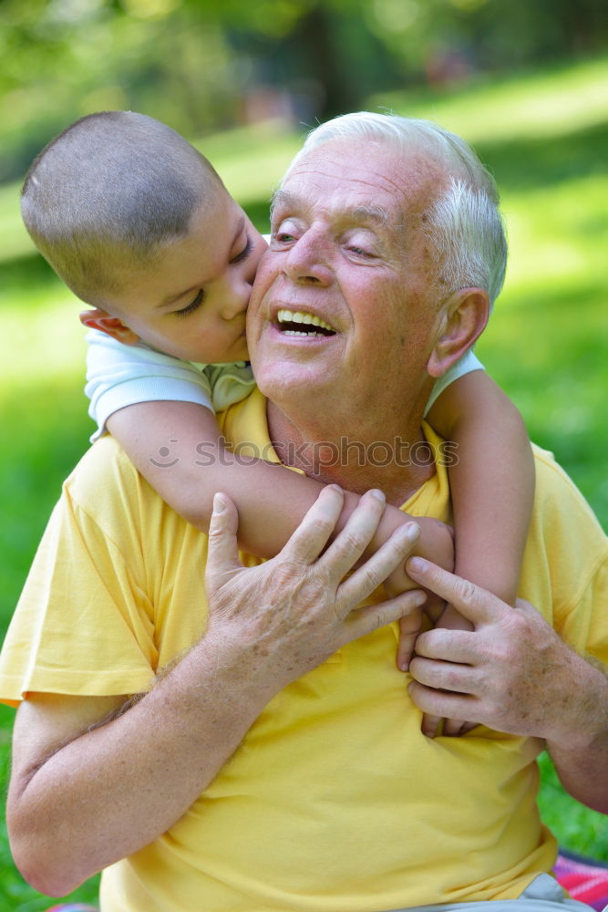 Similar – Portrait of grandfather and grandson embracing