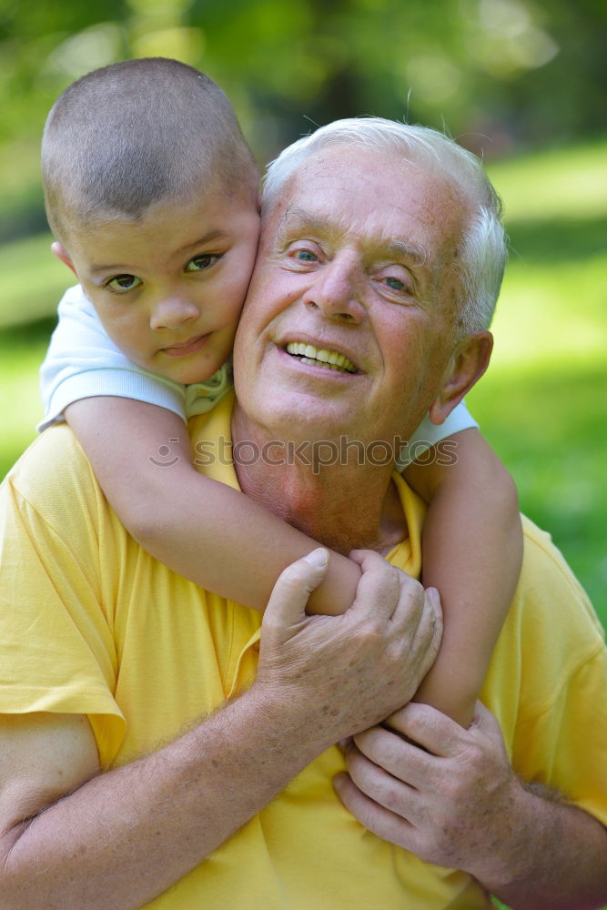 Similar – Portrait of grandfather and grandson embracing