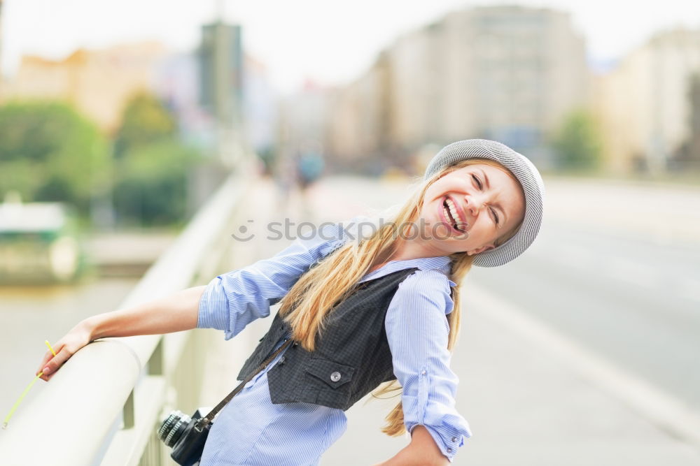 Beautiful young caucasian woman smiling outdoors