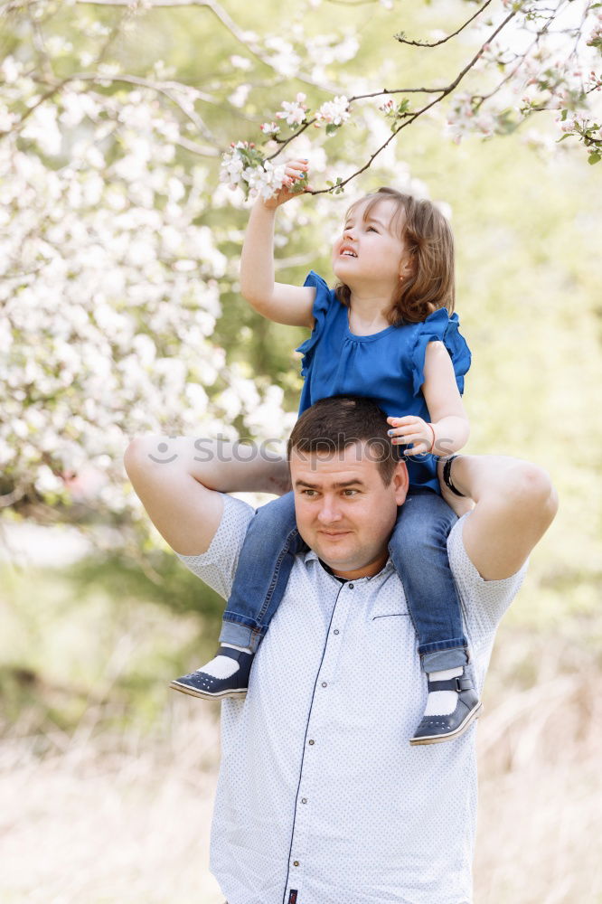 Similar – Image, Stock Photo Father holds up his little son