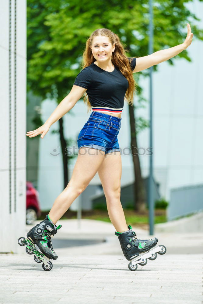 Similar – Image, Stock Photo Slim young woman enjoys inline skating