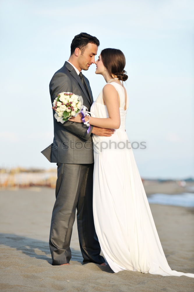 Similar – Image, Stock Photo Crop bride with bouquet embracing groom