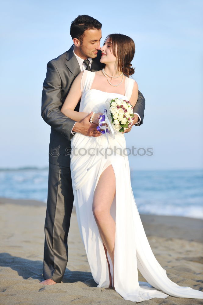 Similar – Image, Stock Photo Tender kissing bridal couple in sunlight