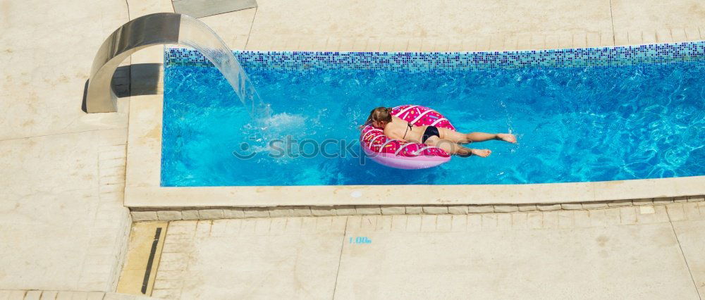 Cheerful girl posing in life vest