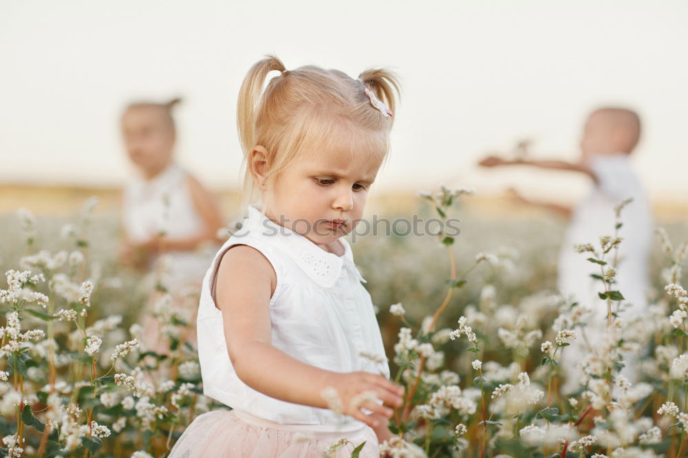 Similar – Image, Stock Photo Dad teaching daughter about nature