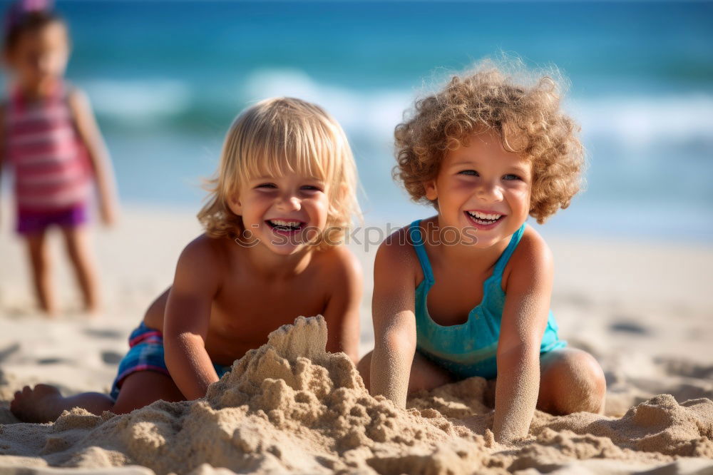 Similar – Two happy children playing on the beach