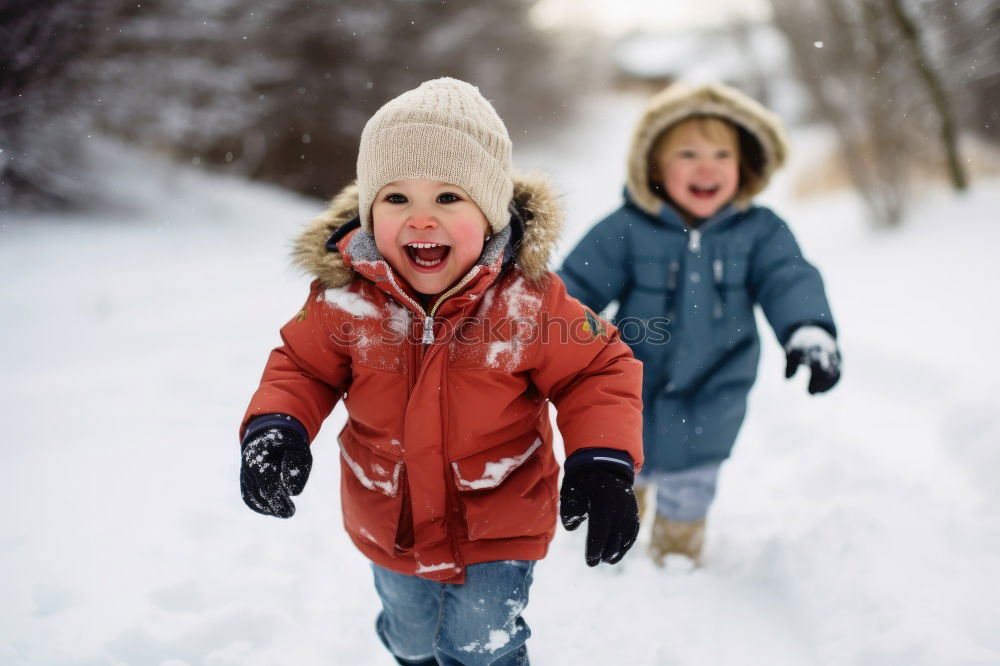 Similar – Mother is playing with her little daughter outdoors in winter