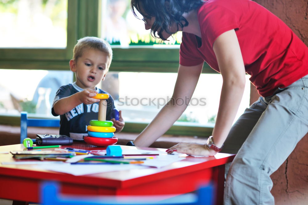 Similar – Happy baby playing with toy blocks.