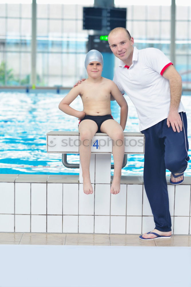 Similar – Grandpa and grandson smiling on a swimming pool side