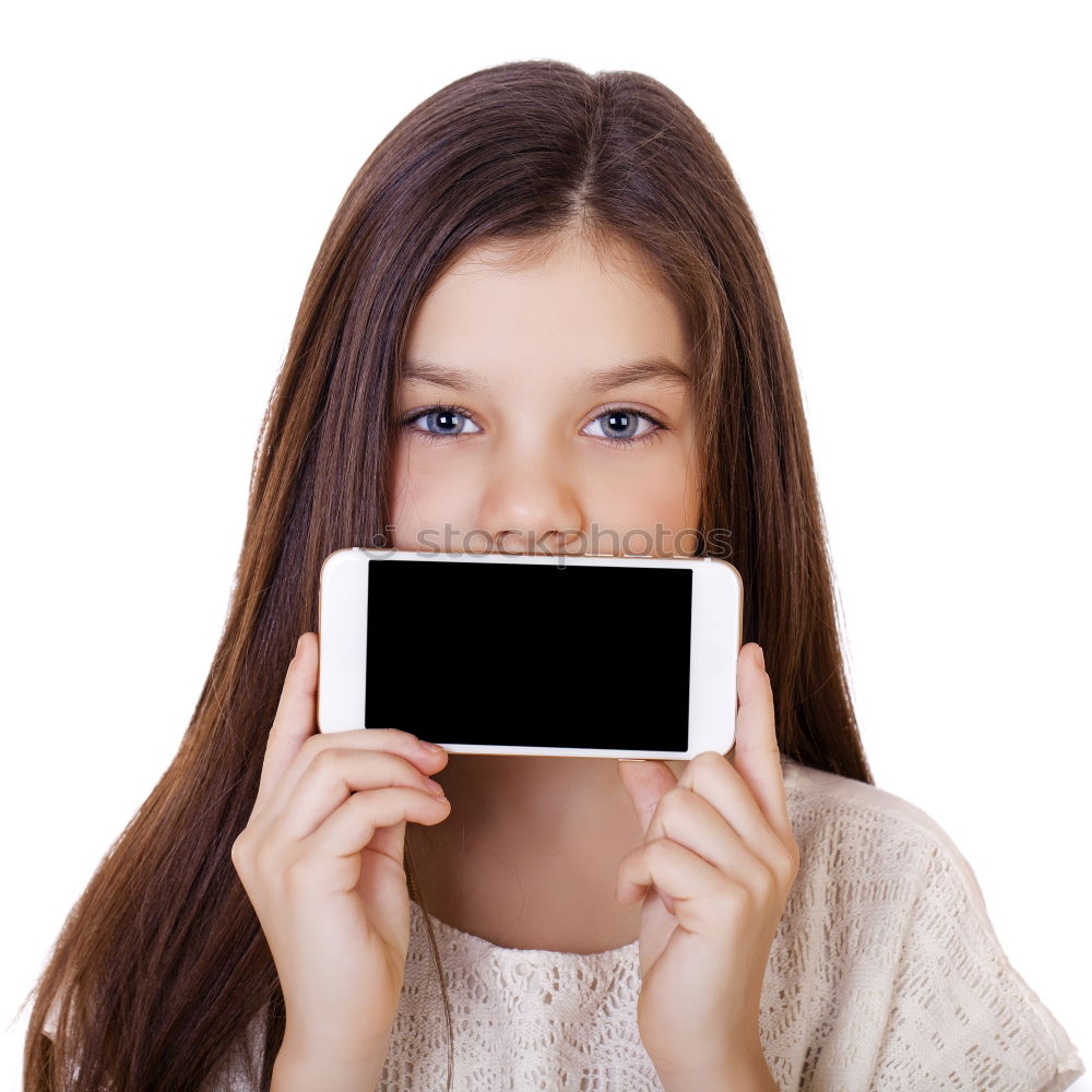 Similar – portrait of a beautiful kid using mobile phone