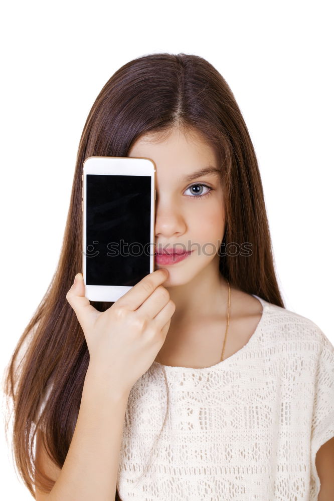 Similar – portrait of a beautiful kid using mobile phone