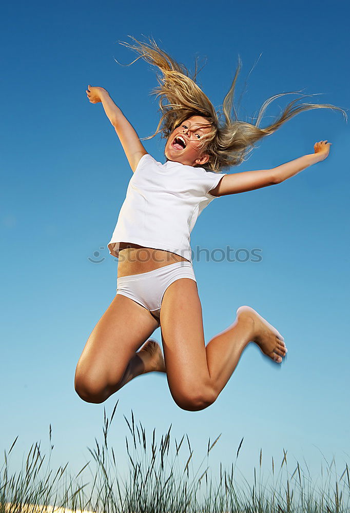 Similar – Foto Bild sommer. springen feminin 1