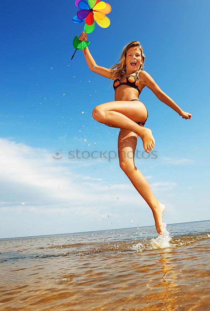 Image, Stock Photo Little girl standing on the beach