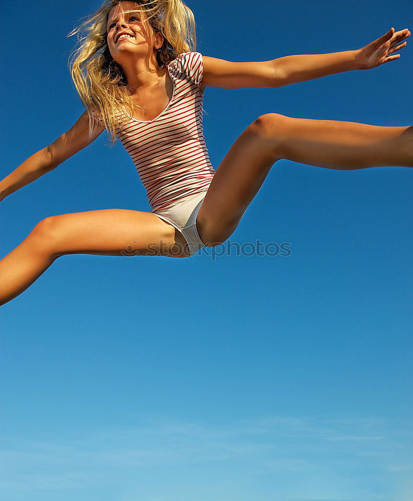 Similar – Foto Bild sommer. springen feminin 1