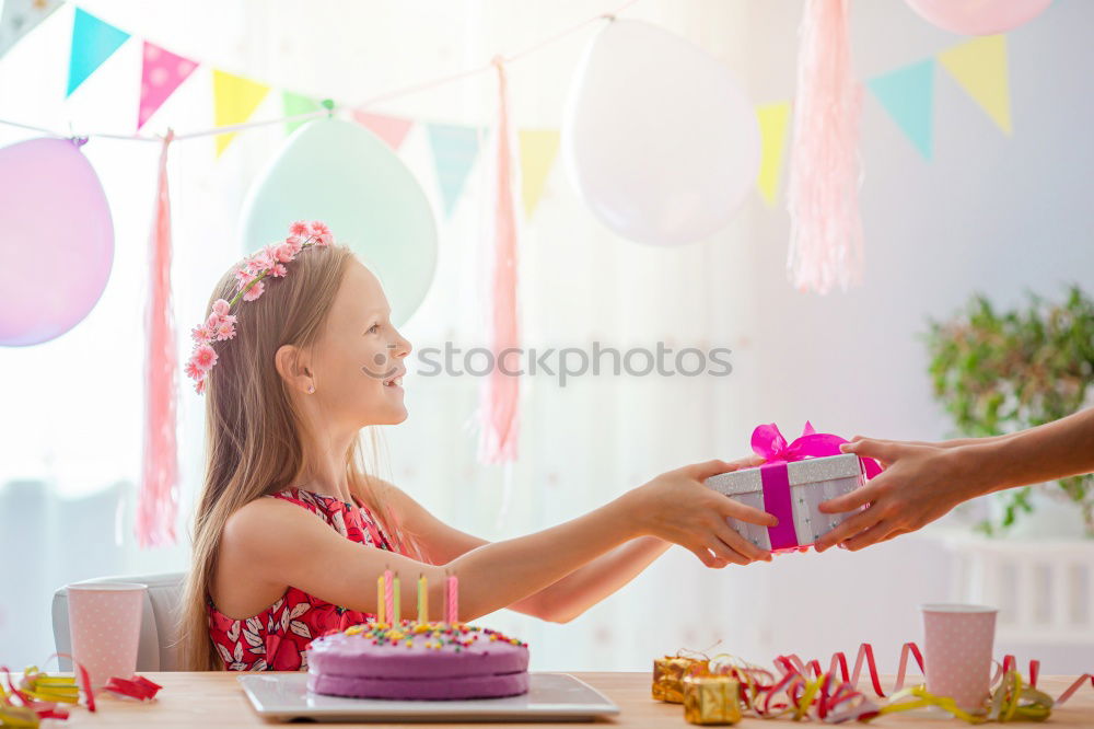 Similar – child girl playing checkers with her dad