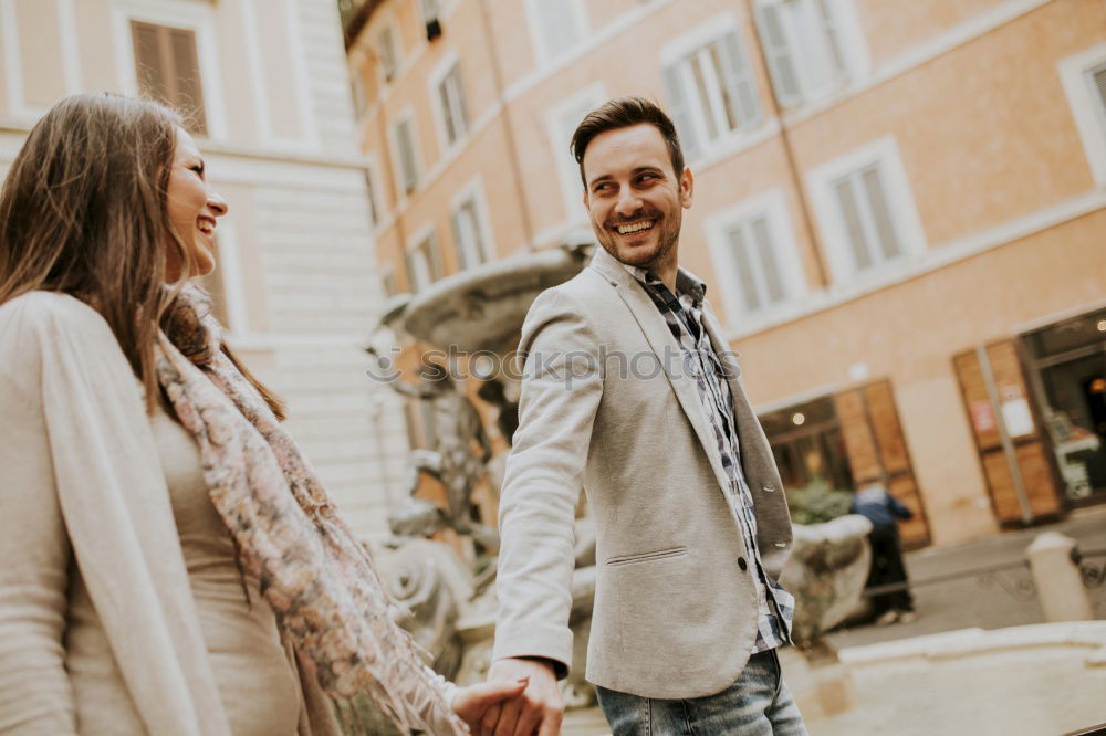 Similar – Image, Stock Photo Smiling couple of lovers having fun.