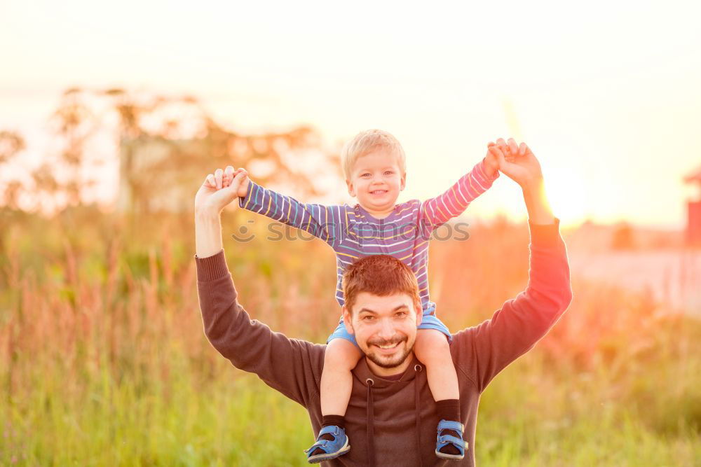 Similar – Image, Stock Photo happy father and daughter walking on summer meadow