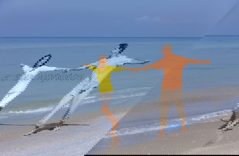 Similar – Image, Stock Photo Father and son playing on the beach at the day time.