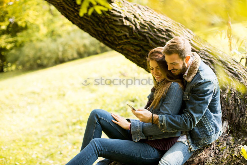 Similar – Image, Stock Photo Girl siting under the tree, reading the book