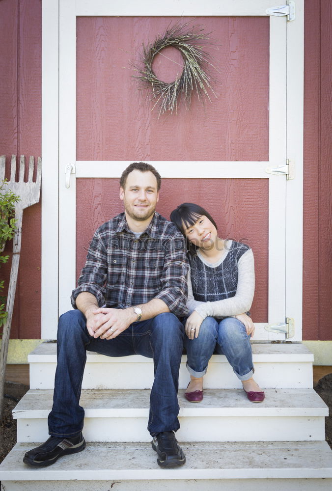 Similar – Image, Stock Photo Young couple in front of a wooden hut in traditional costume