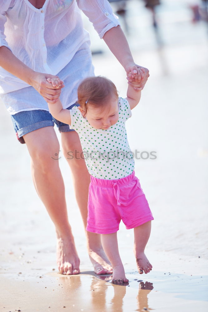 Similar – mother looking with admiration at baby child