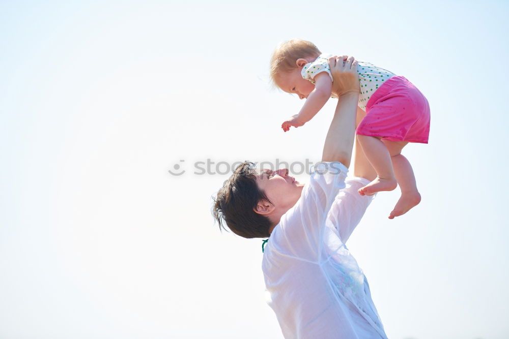 Similar – Father and son playing on the beach at the day time. Concept of friendly family.