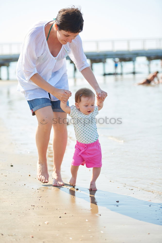 Similar – mother looking with admiration at baby child