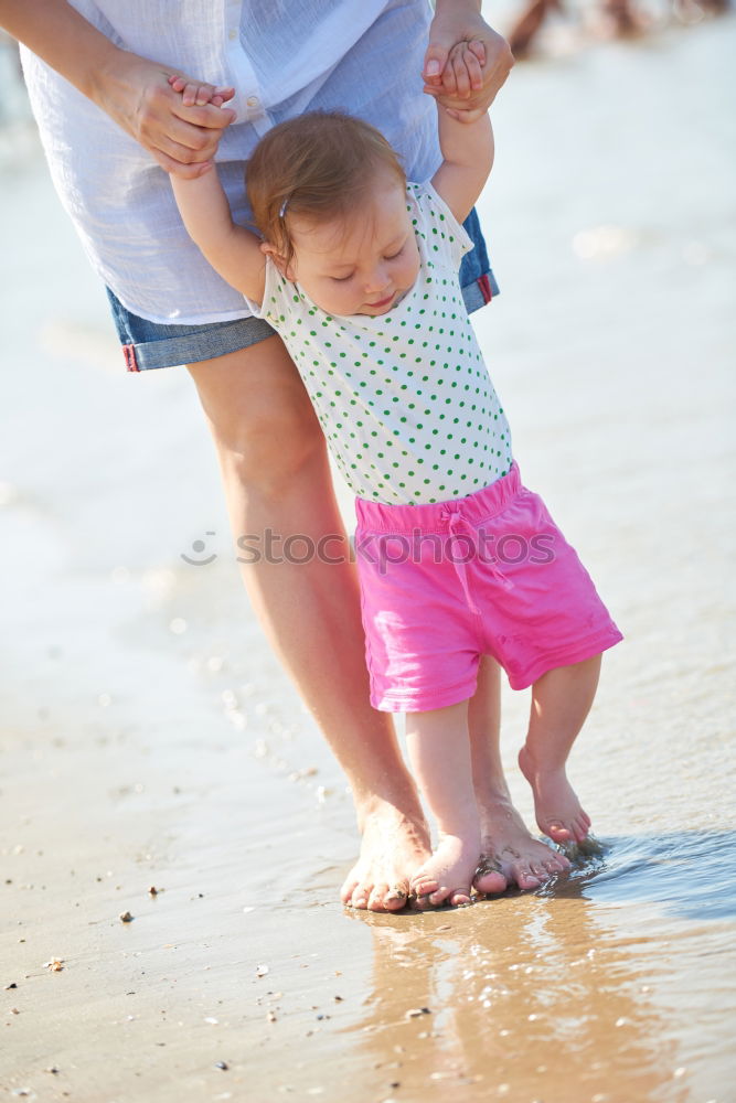 Similar – mother looking with admiration at baby child