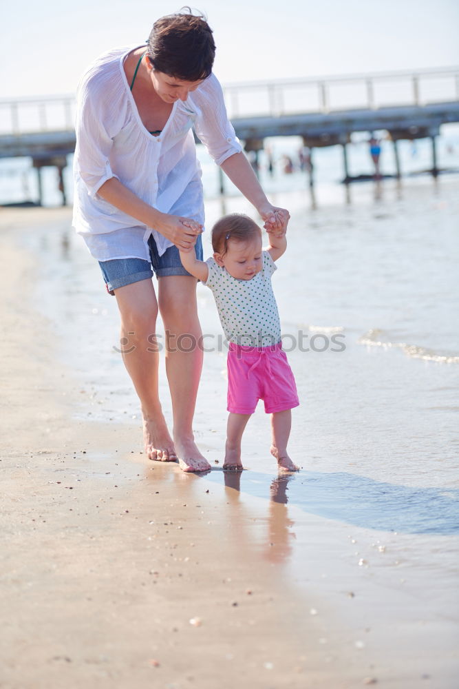 Similar – mother looking with admiration at baby child