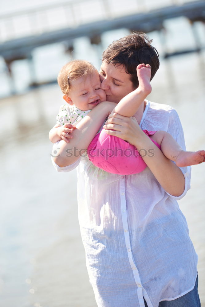 Similar – Image, Stock Photo Young boy and his little sister sitting on jetty over the lake and dipping feet in water on sunny day in the summertime